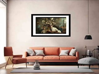 Framed artwork above a sofa in a living room setting