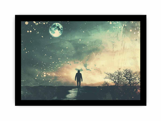 Framed artwork of a silhouette walking on a path with a starry night sky and moon.