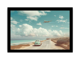 Vintage car on a road with an airplane flying overhead against a blue sky with clouds.