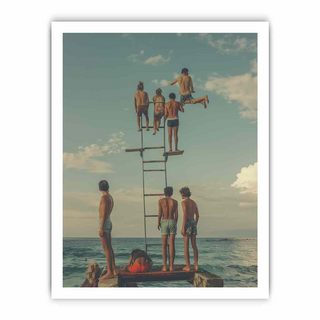 People on a diving board by the ocean with a white border