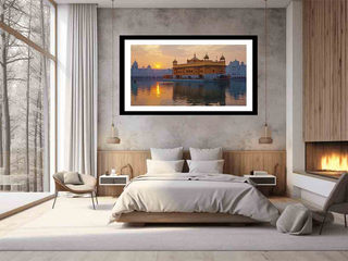 Framed artwork of a sunset over a temple on water in a bedroom setting.
