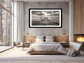 Modern bedroom with a large framed artwork on the wall
