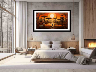 Framed artwork of a sunset over a savannah scene in a bedroom setting.