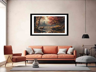 Framed painting above a sofa in a living room