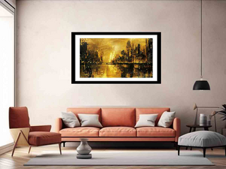 Living room with a large framed artwork on the wall above an orange sofa.