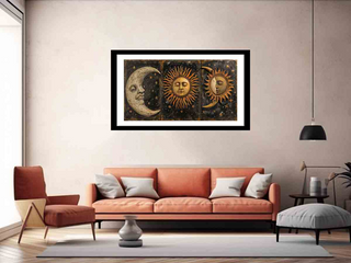 Framed artwork of celestial design above a sofa in a living room.