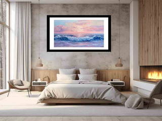 Framed artwork of a sunset over water in a modern bedroom.